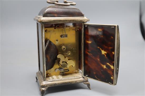 A George V silver mounted tortoiseshell carriage timepiece, Adie Bros. Birmingham, 1928, ( tortoiseshell a.f.), 15cm.